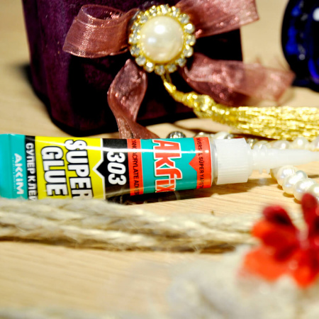 картинка Супер клей Akfix 303 от магазина Огнекор